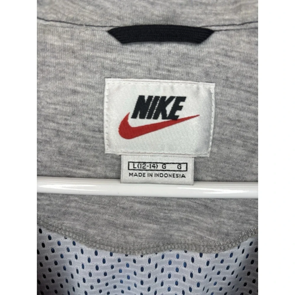 VINTAGE Nike Rain Jacket Boys 12-14 Large Blue Spellout Center Swoosh Pullover